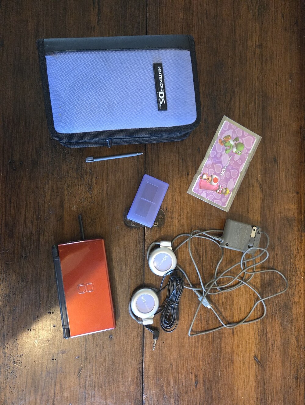 Nintendo DS Lite Red Handheld with Purple Case and Accessories